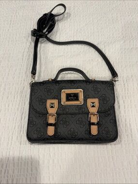 GUESS Black Crossbody Satchel with Tan Accent Straps and Gold Plaque